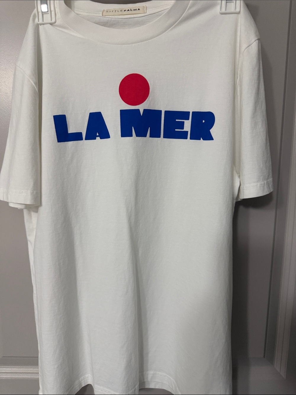 La Mer White Tee with Blue Logo and Red Dot